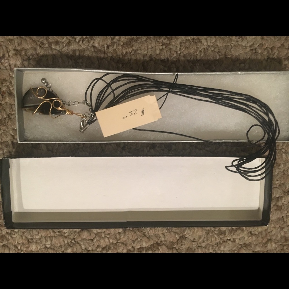 Gold and black pendant necklace